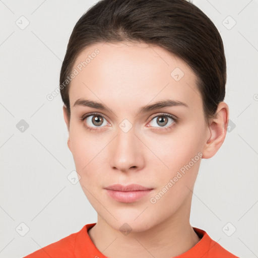 Neutral white young-adult female with short  brown hair and brown eyes