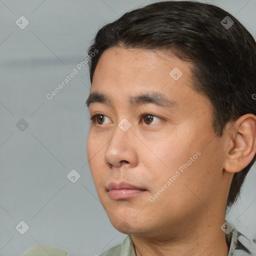 Neutral white young-adult male with short  black hair and brown eyes