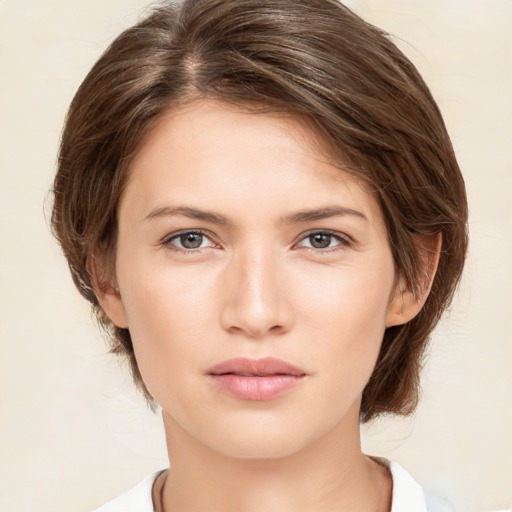 Neutral white young-adult female with medium  brown hair and brown eyes