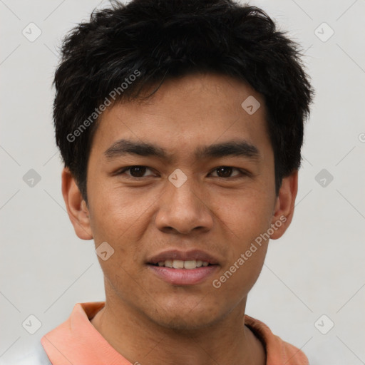 Joyful asian young-adult male with short  black hair and brown eyes