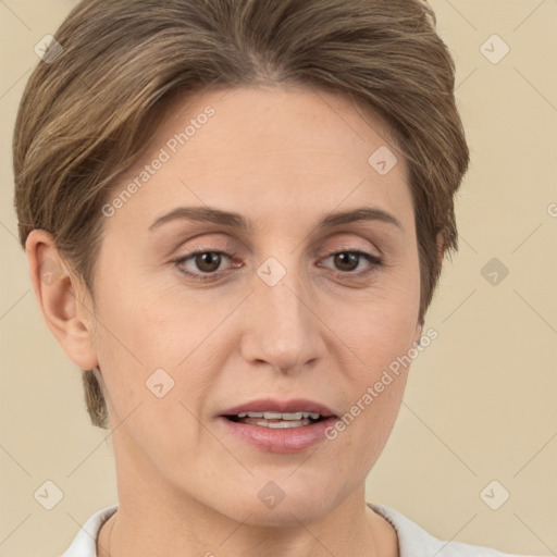 Joyful white adult female with short  brown hair and grey eyes