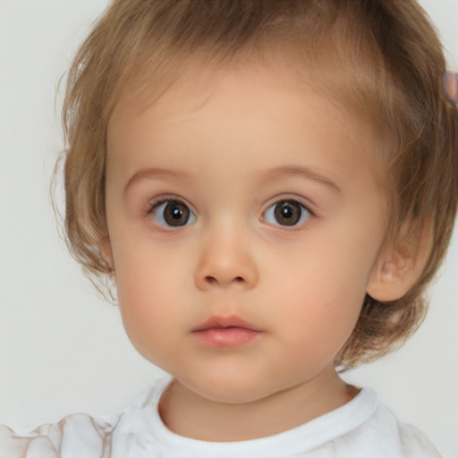 Neutral white child female with medium  brown hair and brown eyes