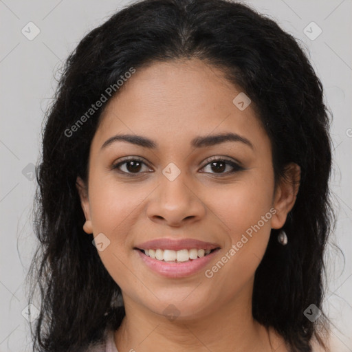 Joyful latino young-adult female with long  brown hair and brown eyes