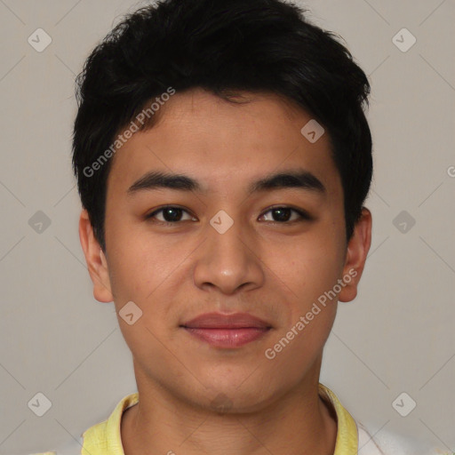 Joyful asian young-adult male with short  black hair and brown eyes