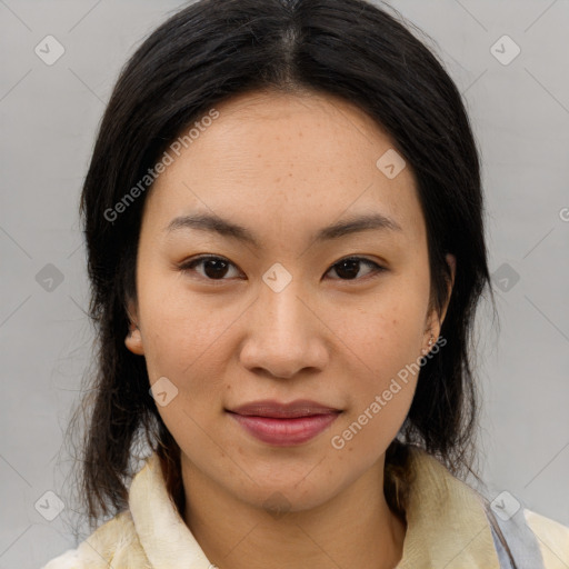 Joyful asian young-adult female with medium  brown hair and brown eyes