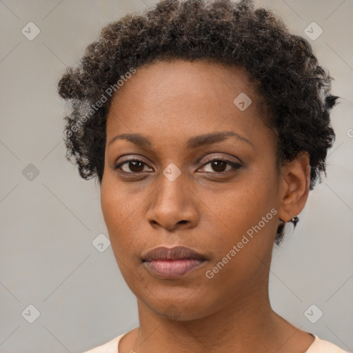 Neutral black young-adult female with short  brown hair and brown eyes