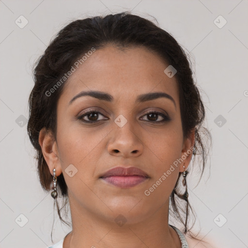 Joyful latino young-adult female with long  brown hair and brown eyes