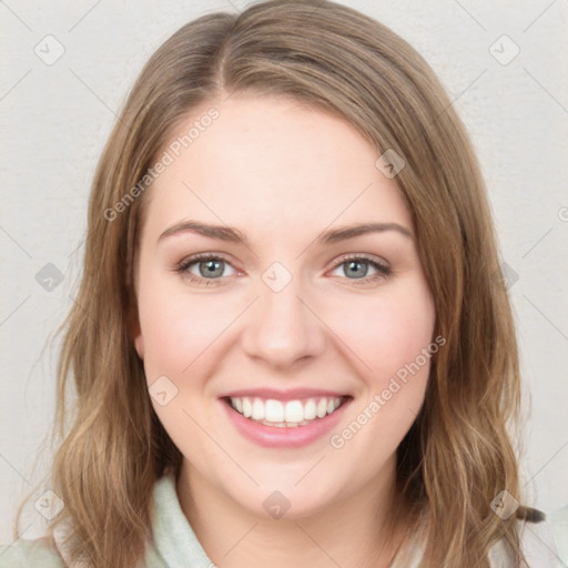 Joyful white young-adult female with medium  brown hair and green eyes