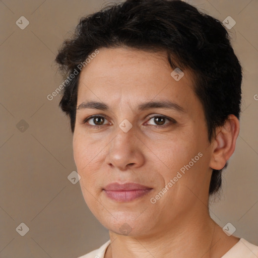 Joyful white adult female with short  brown hair and brown eyes