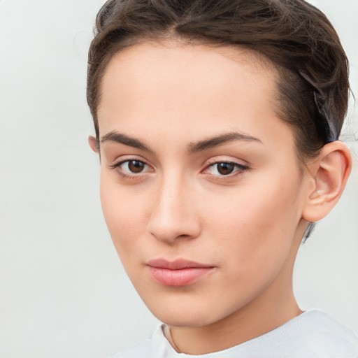 Neutral white young-adult female with short  brown hair and brown eyes