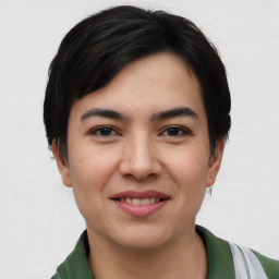 Joyful asian young-adult female with short  black hair and brown eyes