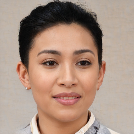 Joyful asian young-adult female with short  brown hair and brown eyes