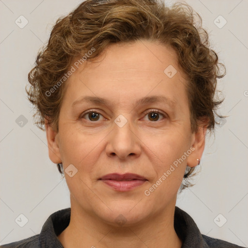 Joyful white adult female with short  brown hair and brown eyes