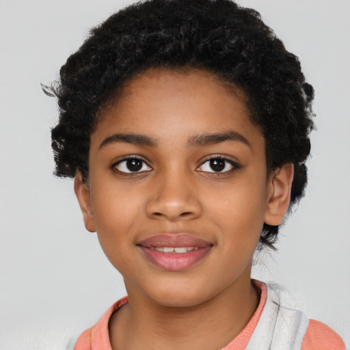Joyful black child female with short  black hair and brown eyes