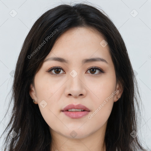 Joyful asian young-adult female with long  brown hair and brown eyes