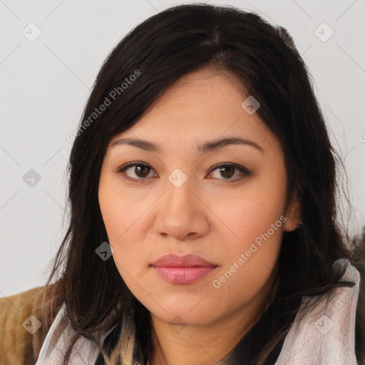 Joyful asian young-adult female with long  brown hair and brown eyes