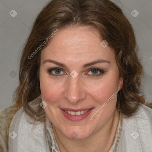 Joyful white adult female with medium  brown hair and blue eyes