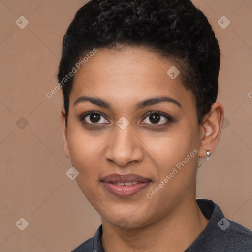 Joyful black young-adult female with short  brown hair and brown eyes