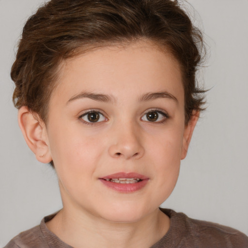 Joyful white child female with short  brown hair and brown eyes