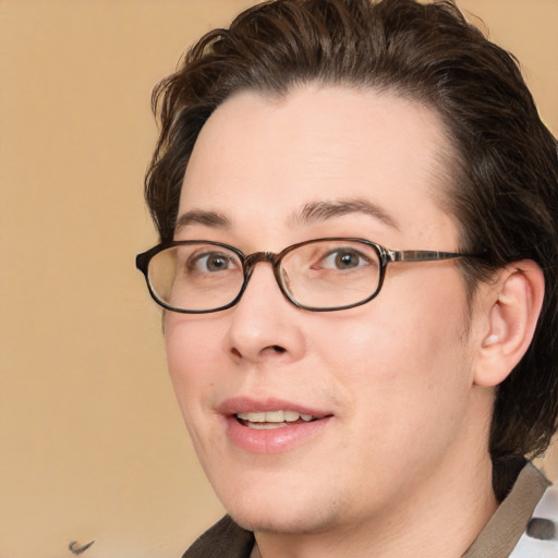 Joyful white young-adult male with medium  brown hair and brown eyes