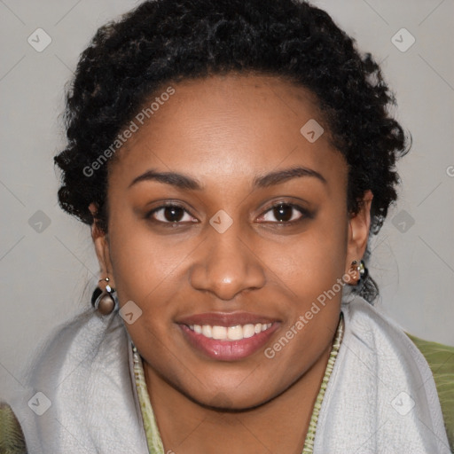 Joyful black young-adult female with long  brown hair and brown eyes