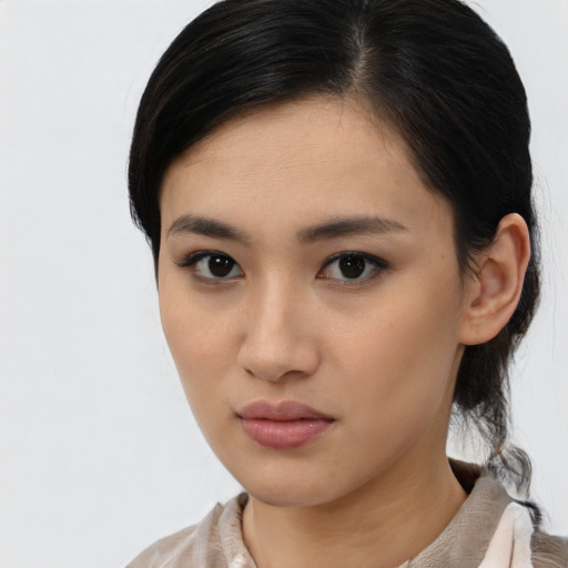 Neutral asian young-adult female with medium  black hair and brown eyes