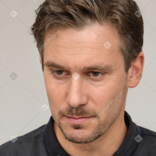 Neutral white adult male with short  brown hair and brown eyes