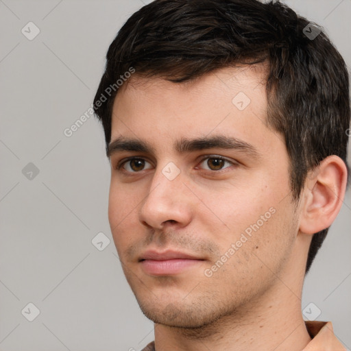 Neutral white young-adult male with short  brown hair and brown eyes