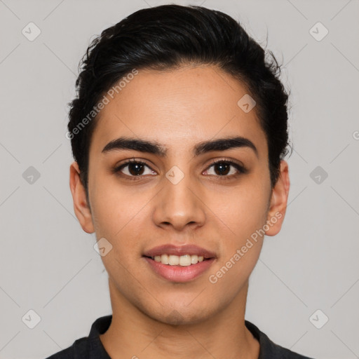 Joyful latino young-adult female with short  black hair and brown eyes