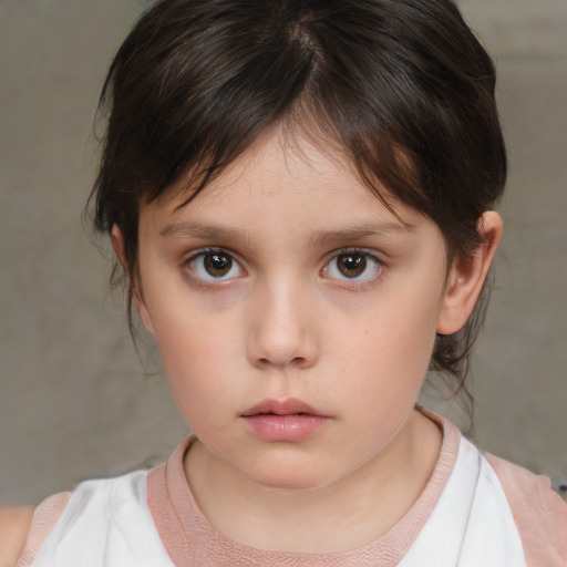 Neutral white child female with medium  brown hair and brown eyes