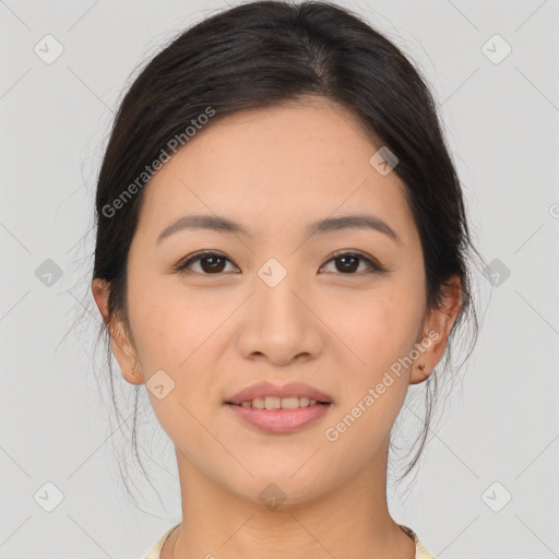 Joyful asian young-adult female with long  brown hair and brown eyes