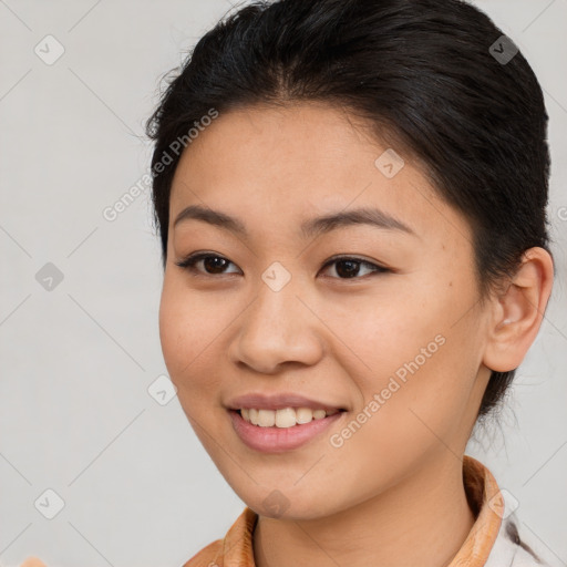 Joyful latino young-adult female with medium  brown hair and brown eyes