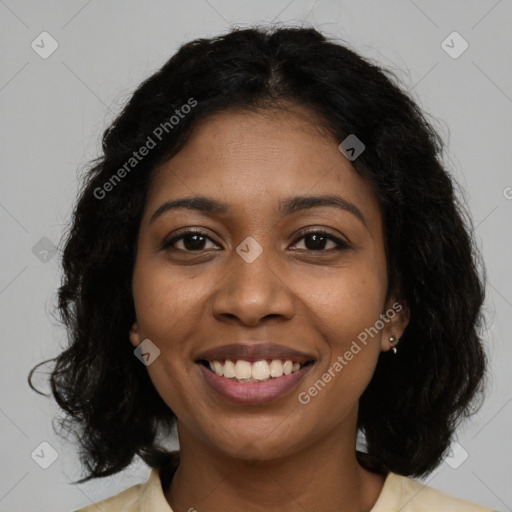 Joyful black young-adult female with medium  brown hair and brown eyes