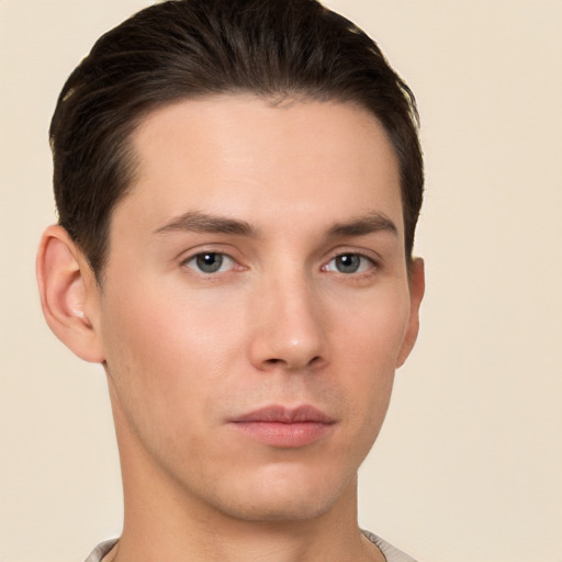 Neutral white young-adult male with short  brown hair and brown eyes