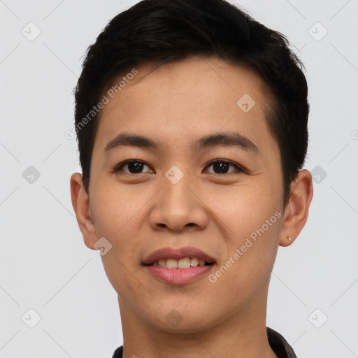 Joyful asian young-adult male with short  brown hair and brown eyes