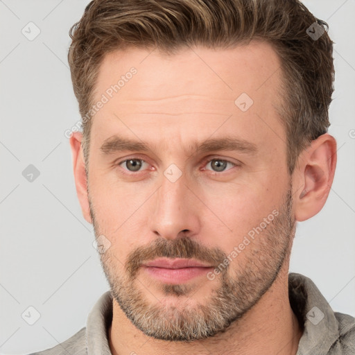 Neutral white adult male with short  brown hair and brown eyes