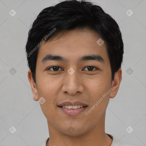 Joyful asian young-adult male with short  black hair and brown eyes