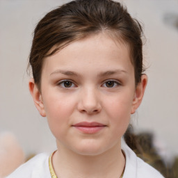 Joyful white child female with short  brown hair and brown eyes