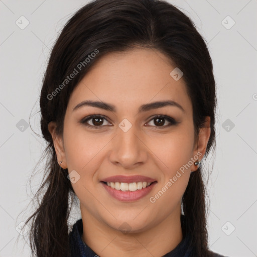 Joyful white young-adult female with long  brown hair and brown eyes