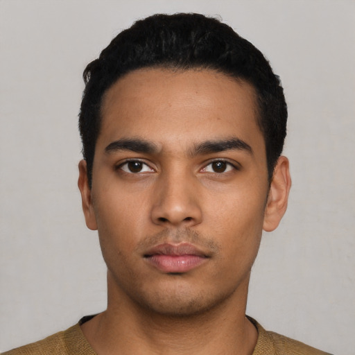 Neutral latino young-adult male with short  black hair and brown eyes