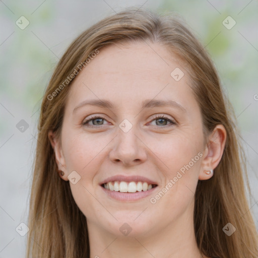 Joyful white young-adult female with long  brown hair and blue eyes