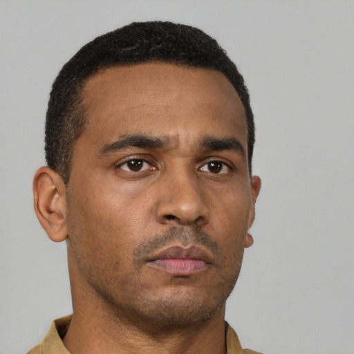 Neutral latino young-adult male with short  brown hair and brown eyes