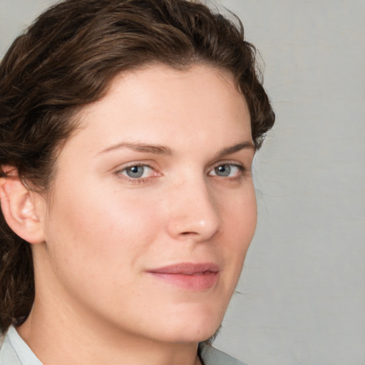 Neutral white young-adult female with medium  brown hair and grey eyes