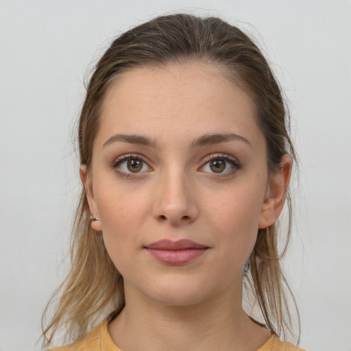 Neutral white young-adult female with medium  brown hair and brown eyes