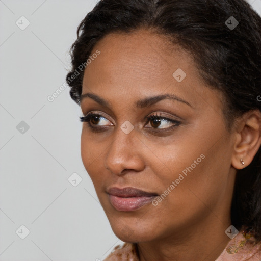 Neutral black young-adult female with medium  brown hair and brown eyes