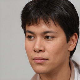 Neutral asian young-adult male with short  brown hair and brown eyes