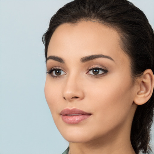 Neutral white young-adult female with long  brown hair and brown eyes