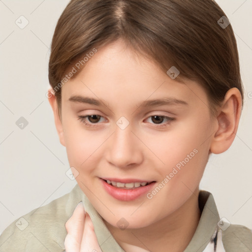 Joyful white child female with short  brown hair and brown eyes