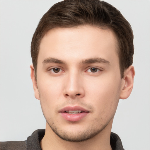 Neutral white young-adult male with short  brown hair and brown eyes