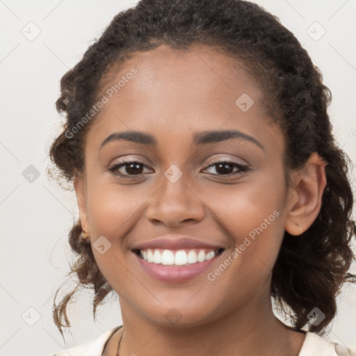 Joyful latino young-adult female with long  brown hair and brown eyes